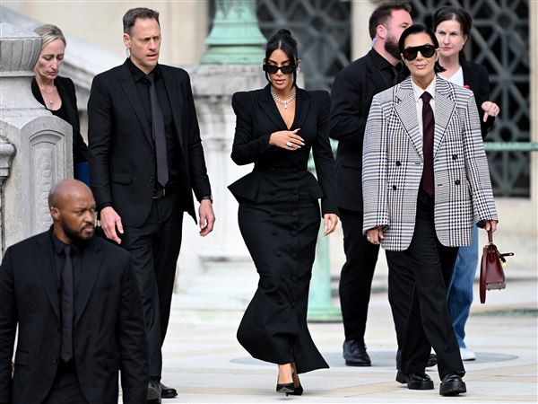 The ringleader of a gang that tied up and robbed billionaire reality TV star Kim Kardashian, center, was found guilty by a Paris court on Friday.
