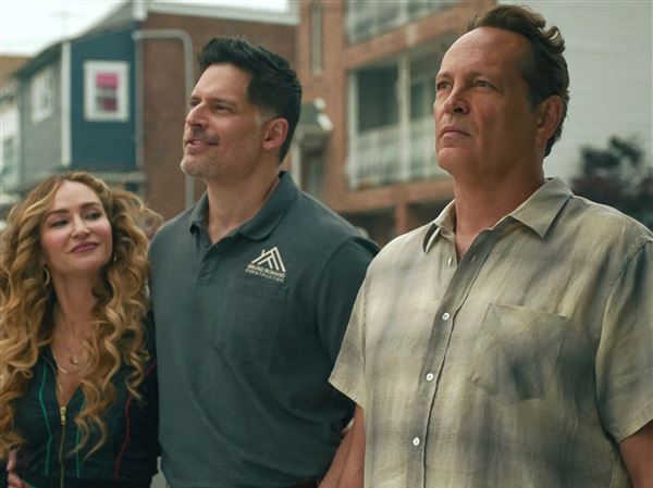 Drea de Matteo, left, Joe Manganiello and Vince Vaughn in the Netflix film "Nonnas." 