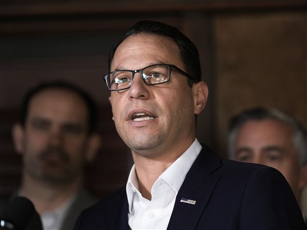 Pennsylvania Gov. Josh Shapiro speaks with members of the media during a news conference in Yardley, Pa., Monday, Dec. 4, 2023. A protest in Philadelphia calling for the end of the siege in Gaza drew criticism from Shapiro as being a “blatant act of antisemitism” after protesters gathered at a Jewish restaurant. (AP Photo/Matt Rourke)