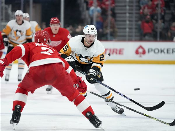Pittsburgh Penguins' David Perron (57) celebrates his goal in the