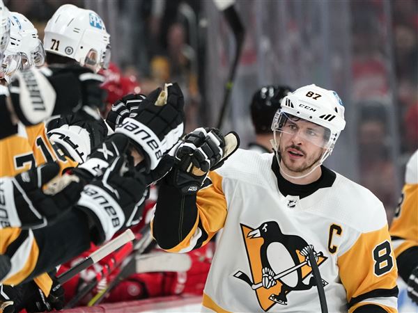 Pirates don Penguins jerseys to show playoff support