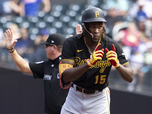 Behind Bryan Reynolds 'Matrix' slide, Pirates get call at plate to beat  Braves for series split