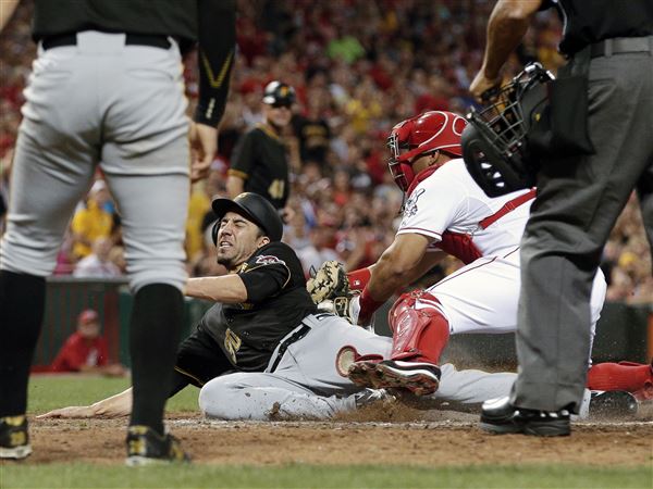 Frazier's homer rallies Reds to opening 5-2 win over Pirates