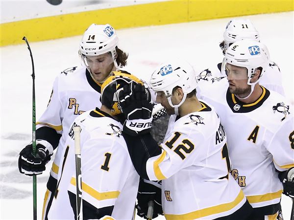 Short-handed Penguins snap mini-skid with win over Devils