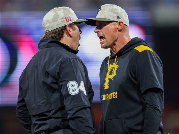 Pirates manager Don Kelly argues and is ejected from the game by third base umpire John Libka (left) in the seventh inning Friday at Citizens Bank Park in Philadelphia.