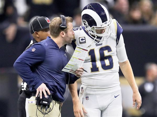 Los Angeles Rams quarterback Jared Goff wears an NFC Champions hat