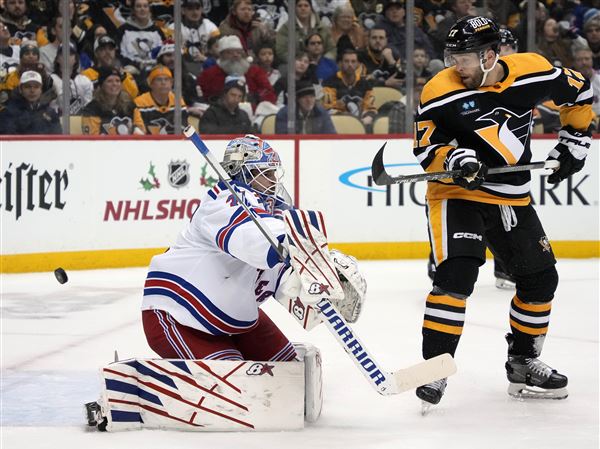 Two power play goals, one highlight-reel save lift Penguins past