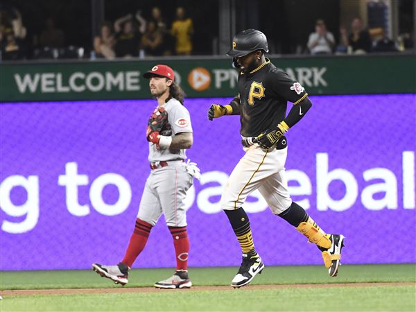 Pittsburgh Pirates pinch hitter Michael Chavis (2) hits an RBI double  against the Boston Red Sox during the sixth inning of a baseball game,  Thursday, Aug. 18, 2022, in Pittsburgh. (AP Photo/Philip