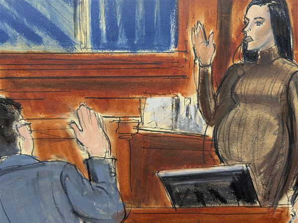 Cassie takes an oath before testifying in Manhattan federal court Tuesday in New York.