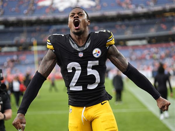 Steelers safety DeShon Elliott celebrates as he heads back to the locker room after beating the Broncos Sept. 15, 2024, in Denver.
