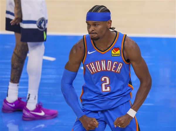 Thunder guard Shai Gilgeous-Alexander reacts after a play against the Timberwolves during  the Western Conference Finals on Thursday in Oklahoma City.