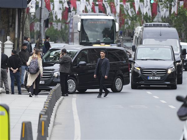 Vehicles begin arriving outside a gate prior to expected talks between Russian and Ukrainian delegations at the Dolmabahce palace, in Istanbul, Turkey, Friday, May 16, 2025.