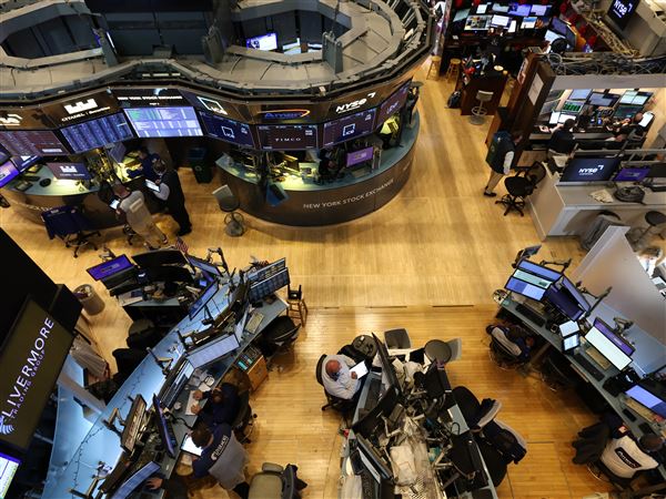 Traders work on the floor of the New York Stock Exchange (NYSE) on Wall Street at the opening bell Tuesday, May 27, 2025, in the Financial District neighborhood of New York City’s Manhattan borough.
