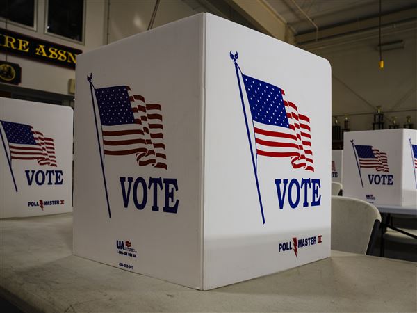 FILE - Voting booths are set up at a polling place in Newtown, Pa., Tuesday, April 23, 2024.