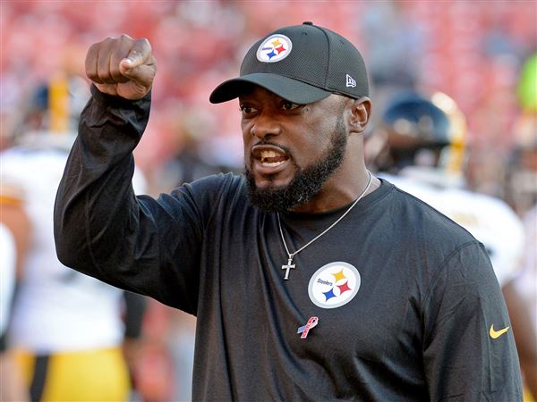 Steelers head coach Mike Tomlin reacts to contract extension