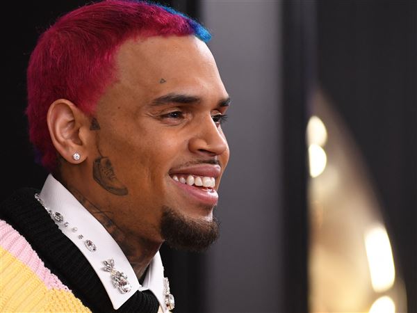 Chris Brown arrives for the 62nd Annual Grammy Awards on January 26, 2020, in Los Angeles. 