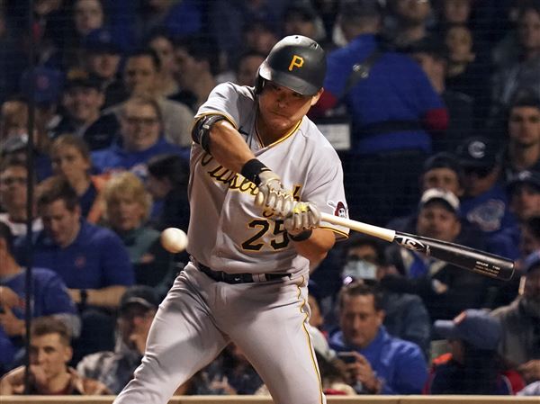 Pittsburgh Pirates' Yoshi Tsutsugo follows through on a line out