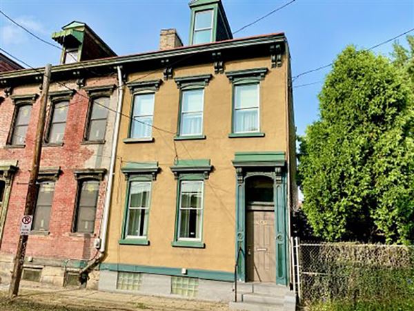 Buying Here 1880 North Side row house with original woodwork