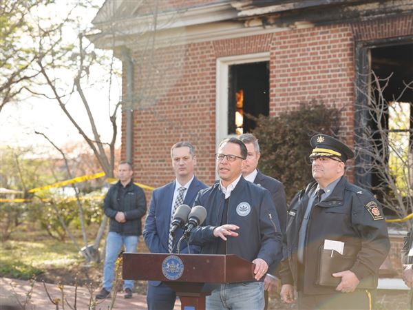 Governor Josh Shapiro speaks outside the fire-damaged Governor's Residence on April 13, after an arson attack. A top Republican lawmaker is calling for a committee investigation of the incident.
