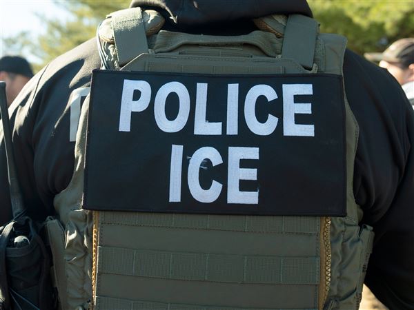 FILE - A U.S. Immigration and Customs Enforcement officer listens during a briefing, Monday, Jan. 27, 2025, in Silver Spring, Md.