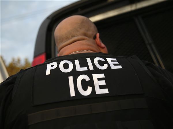 An U.S. Immigration and Customs Enforcement agent in Los Angeles in a file photo.