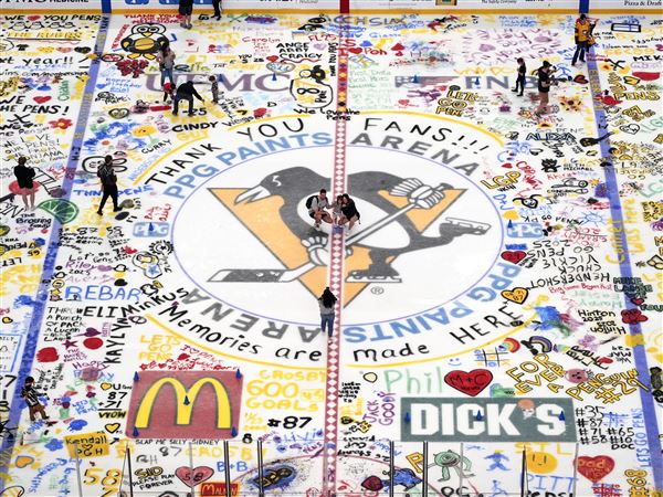Pittsburgh Penguins season ticket holders participate in Paint The Ice day at PPG Arena marking the end of the NHL hockey season for their Penguins, in Pittsburgh, Saturday, April 19, 2025. (AP Photo/Gene J. Puskar)
