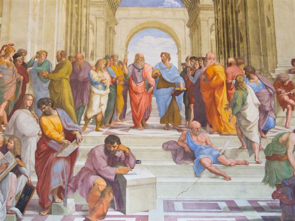 In Raphael’s resco “The School of Athens,” created in 1511, Plato (left) and Aristotle (right) argue about philosophy.
