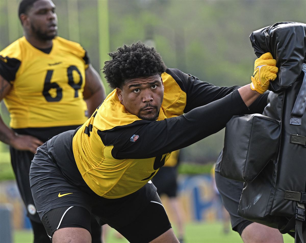 Steelers first round pick Derrick Harmon (99) runs a drill at Steelers rookie minicamp at UPMC Rooney Sports Complex on the South Side on Friday, May 9, 2025.   